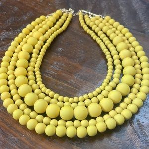 NWOT Beaded multi-strand necklace. Mustard color